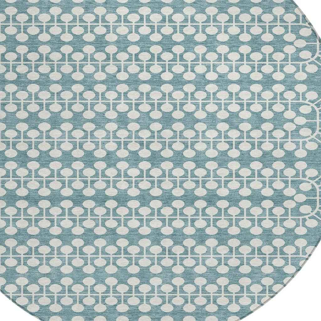 8' Teal Blue And Ivory Round Geometric Washable Indoor Outdoor Area Rug