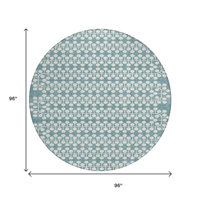8' Teal Blue And Ivory Round Geometric Washable Indoor Outdoor Area Rug