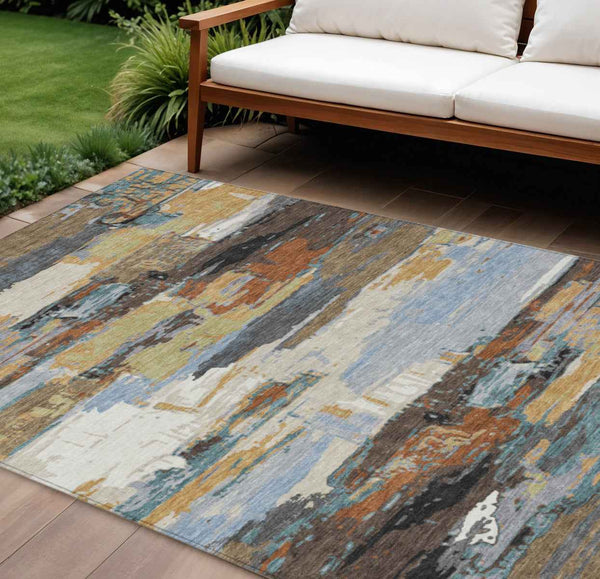9' X 12' Brown Blue Ivory And Gold Abstract Washable Indoor Outdoor Area Rug