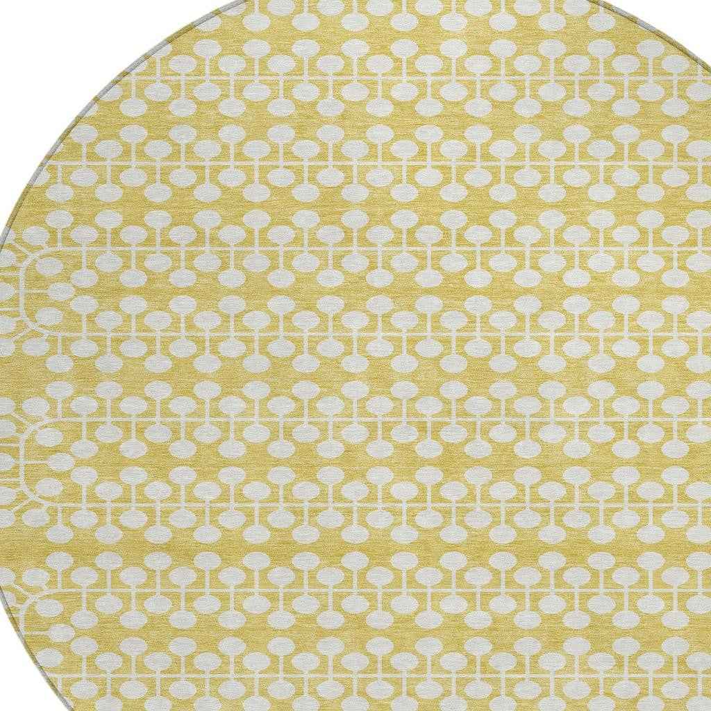 8' Gold And Ivory Round Geometric Washable Indoor Outdoor Area Rug