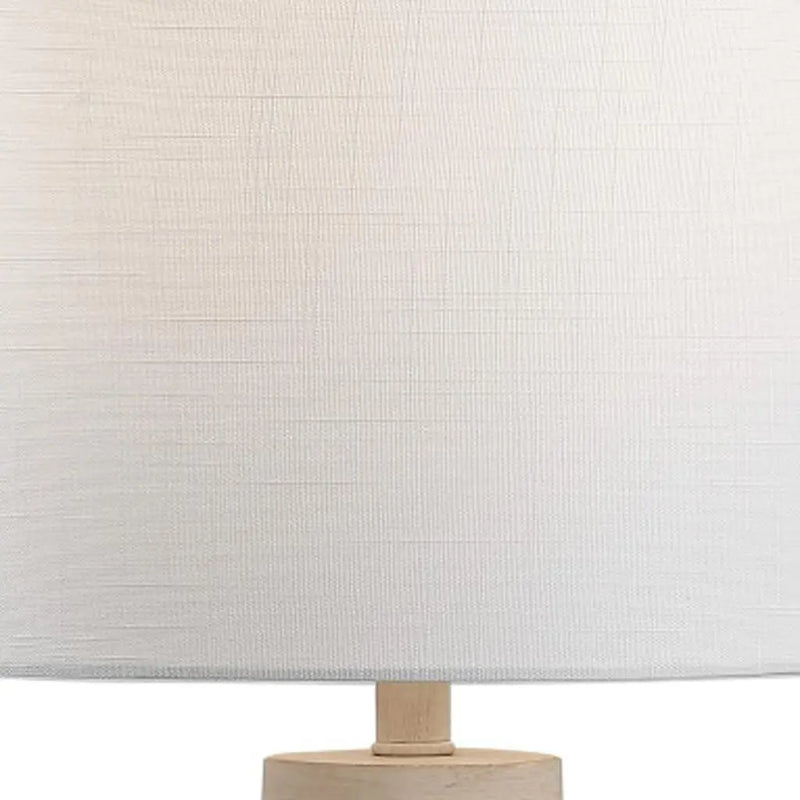 White textured lamp shade with natural wood base, perfect for modern and minimalist home décor.
