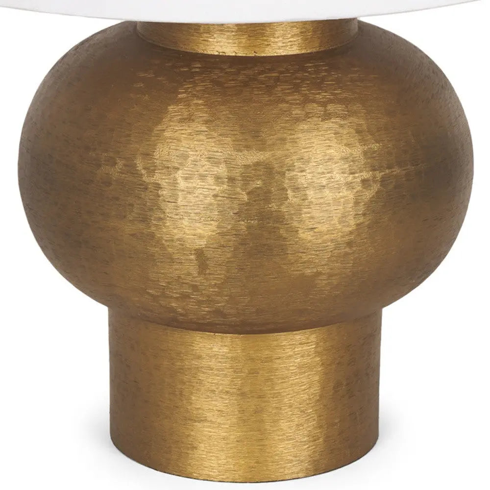 Brushed gold ceramic lamp base with a rounded design, adding a modern touch to any decor.