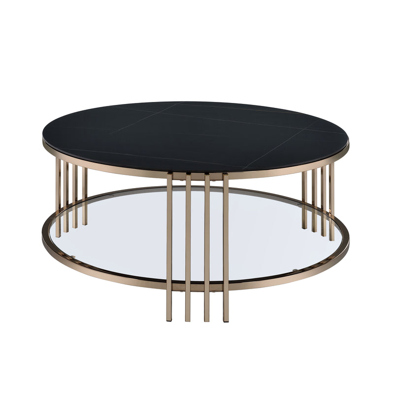 Round coffee table with black tabletop and champagne metal legs; metal ring base.