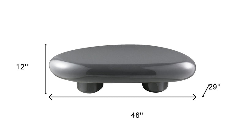 Oval coffee table dimensions, gray tabletop with three round feet supports