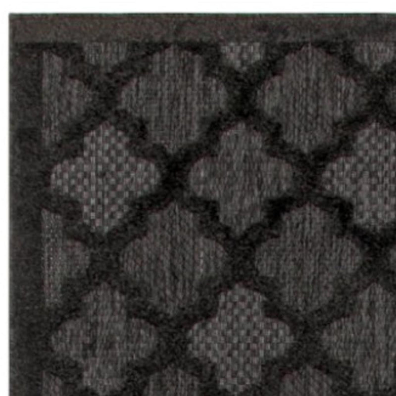 Charcoal and black trellis runner rug with repeating diamond trellis motifs