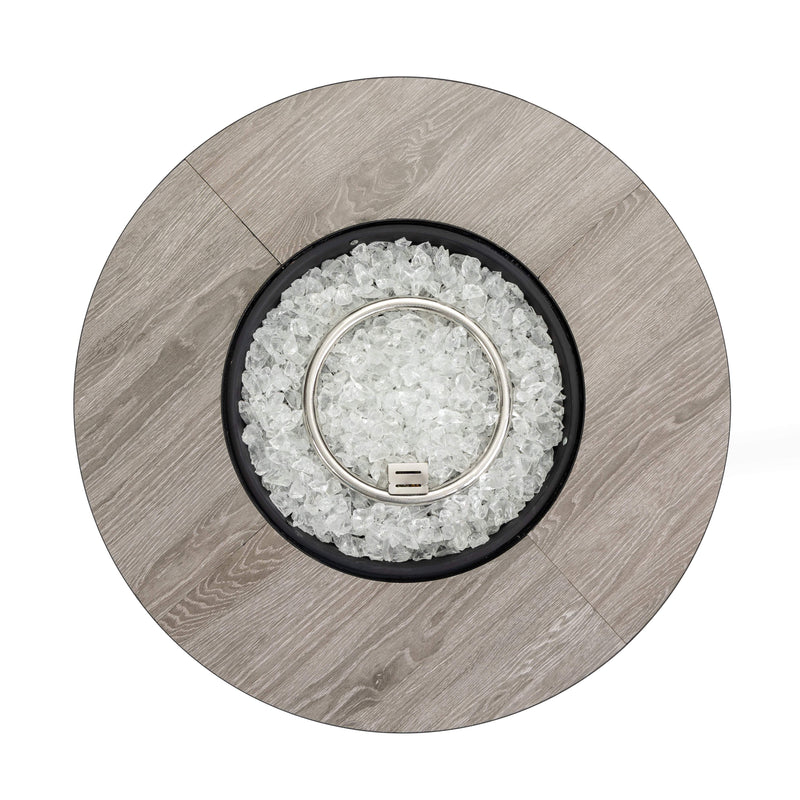 Black propane column fire pit top with clear fire glass and ignition ring