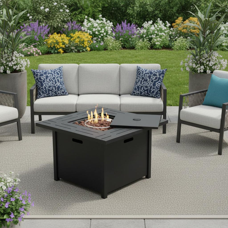 Black propane square fire pit table with lit flame in tabletop