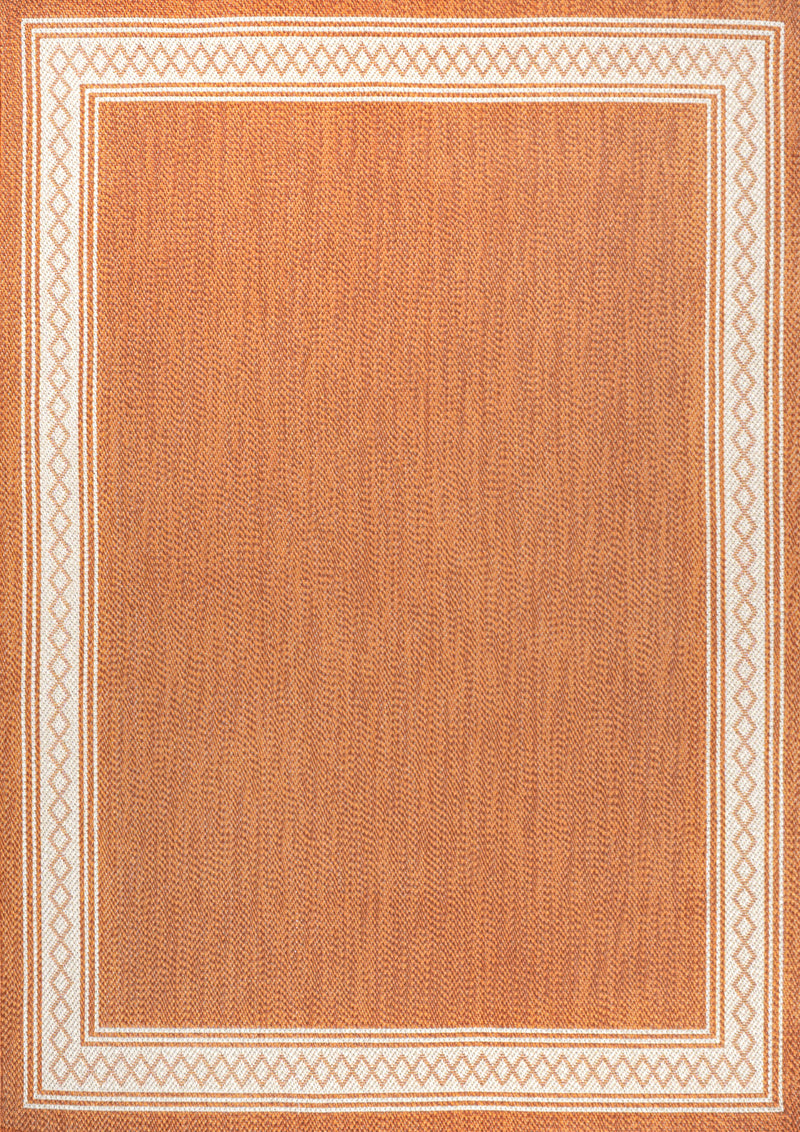 Orange indoor/outdoor area rug with cream frame border and diamond-style geometric trim