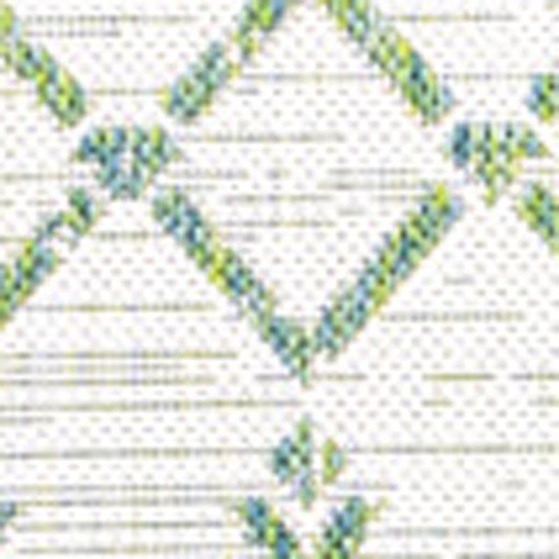 Ivory area rug detail with green trellis lattice crossing lines
