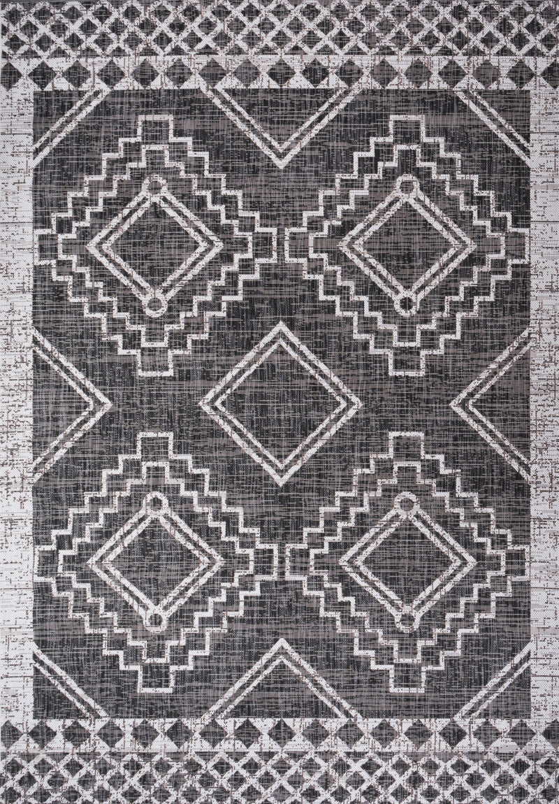 Moroccan geometric area rug in black and ivory with diamond lattice border and medallions.