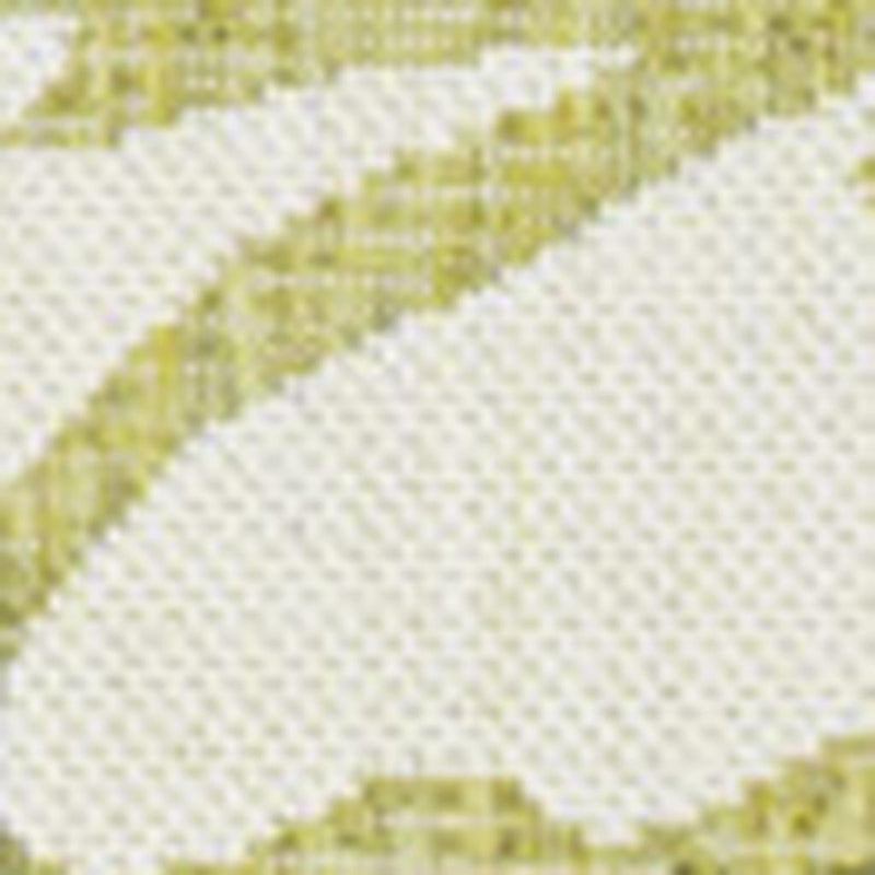 Close-up of green and cream floral area rug with textured woven surface
