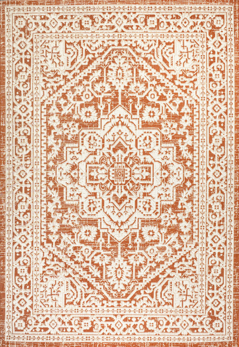 Orange and cream medallion rug with intricate central medallion and ornamental border
