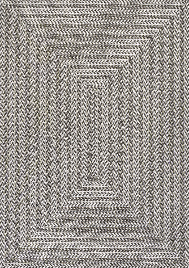 Indoor/outdoor area rug with black-and-light-gray chevron stripes and border edge