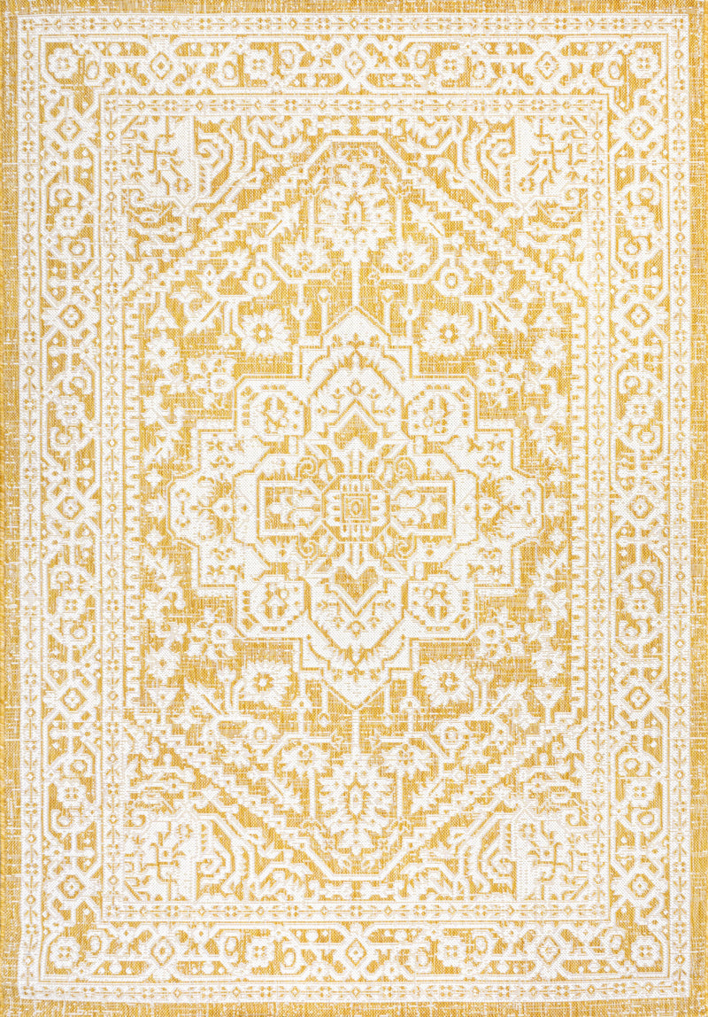 Yellow and cream medallion area rug with ornate geometric border and center motif.