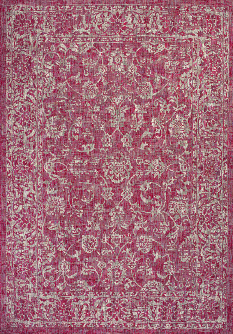 Fuchsia medallion area rug with light gray ornate damask pattern, close-up