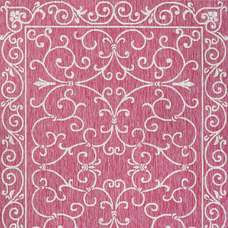 Fuchsia rug with dense light gray medallion scrollwork and border motifs