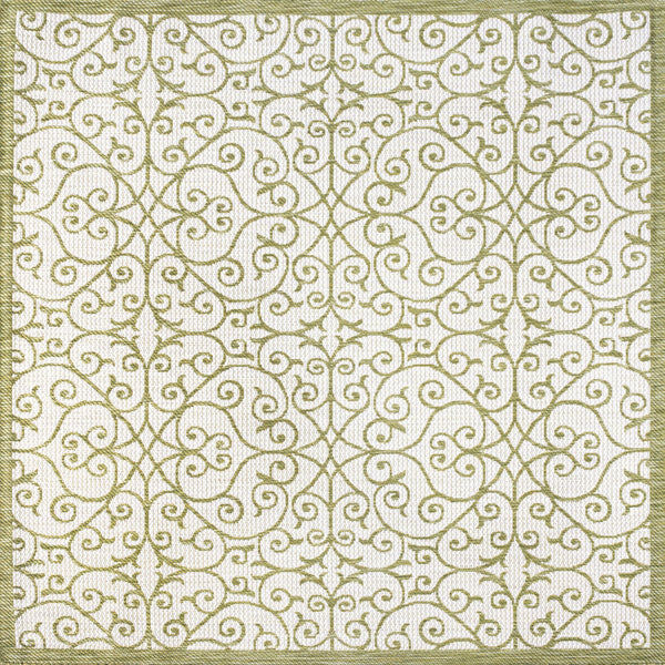 Indoor-outdoor area rug, cream base with green scroll geometric pattern