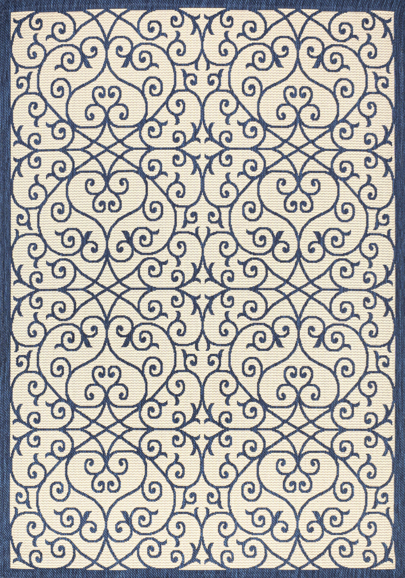 Geometric scroll pattern area rug in navy outlines on beige ground