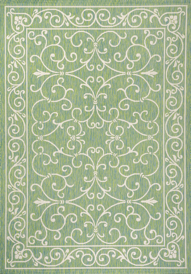 Green indoor outdoor rug with ivory center medallion and corner scrollwork border