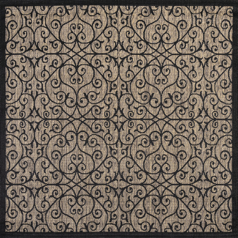 Geometric indoor outdoor area rug with ornate scroll pattern in dark and beige tones