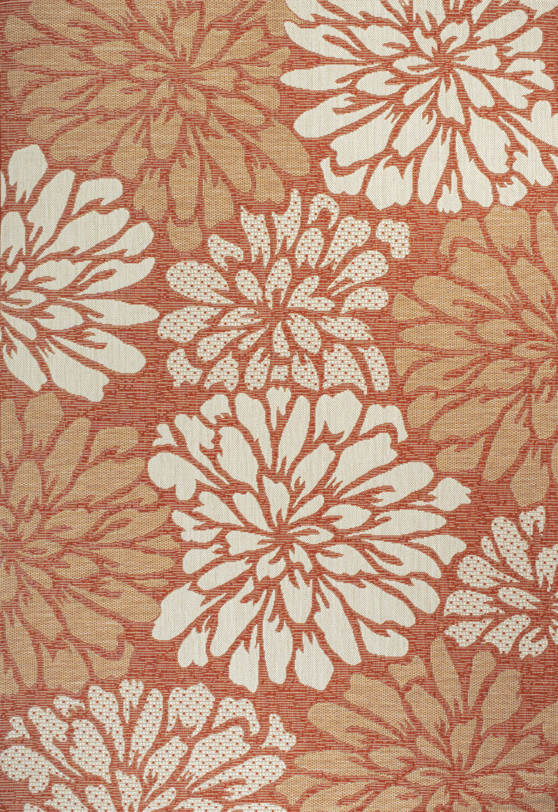 Orange and cream floral area rug with scattered large blossoms and leaf motifs