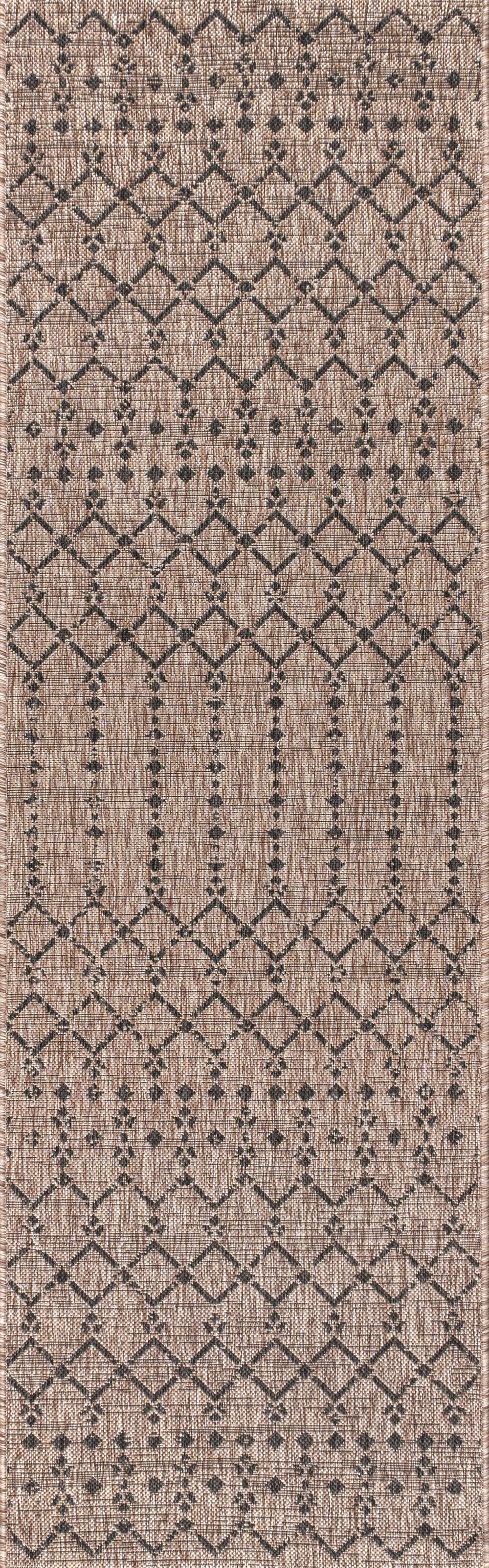 Natural and black trellis patterned indoor outdoor runner rug, full view.