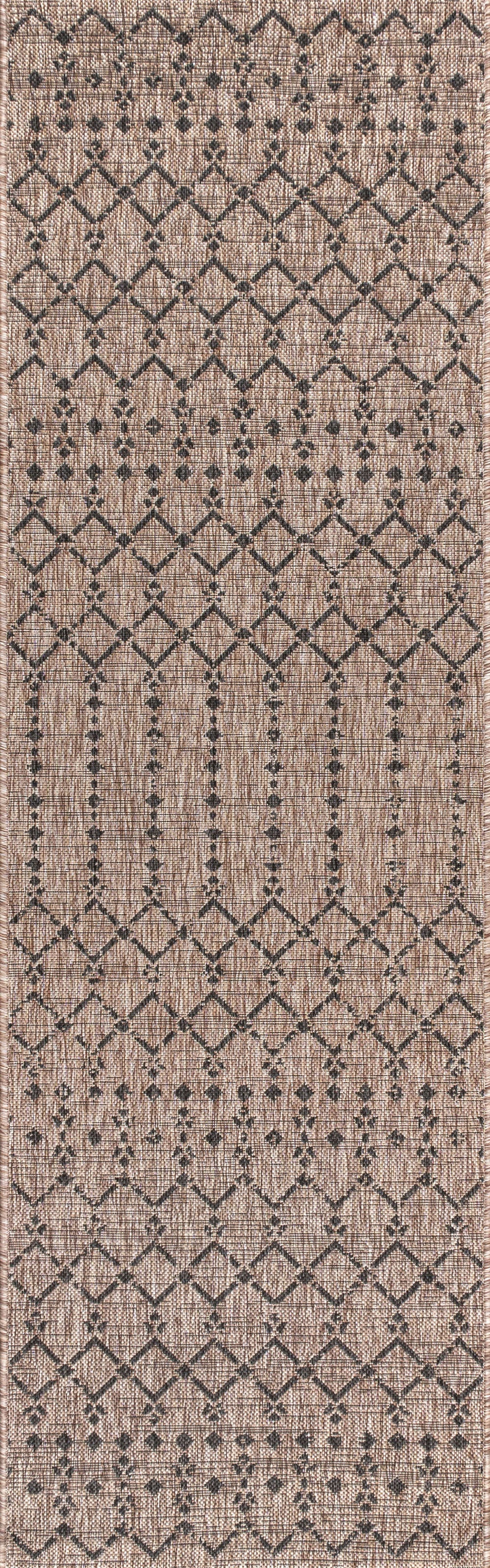 Natural and black trellis runner rug with repeating diamond motif, full view.