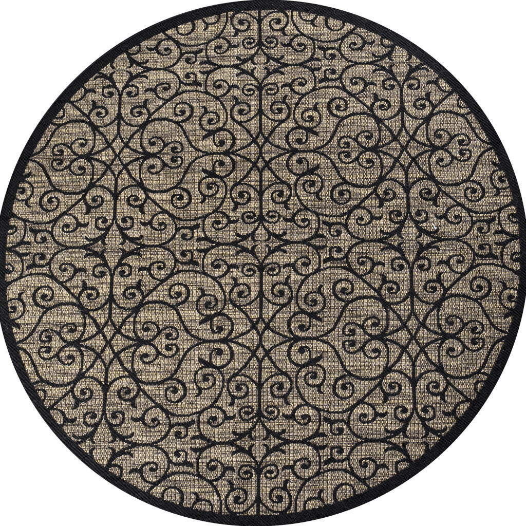 Round black-and-khaki rug with ornate scroll lattice pattern and dark edge trim