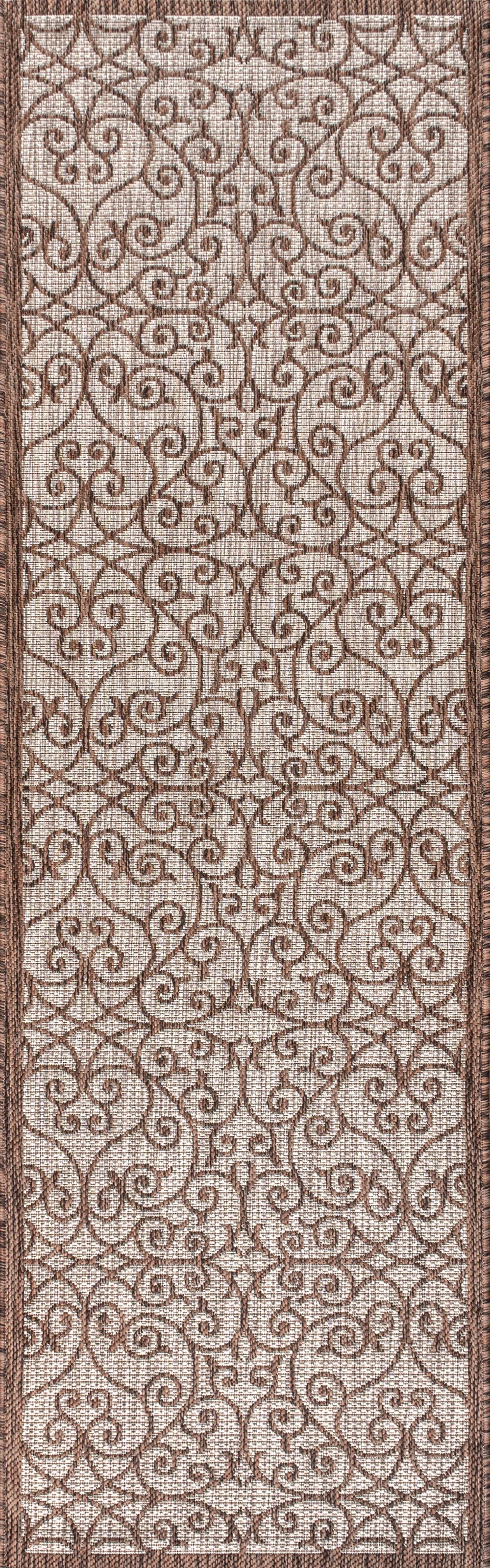 Taupe runner rug with espresso swirled geometric lattice pattern and framed border edges.