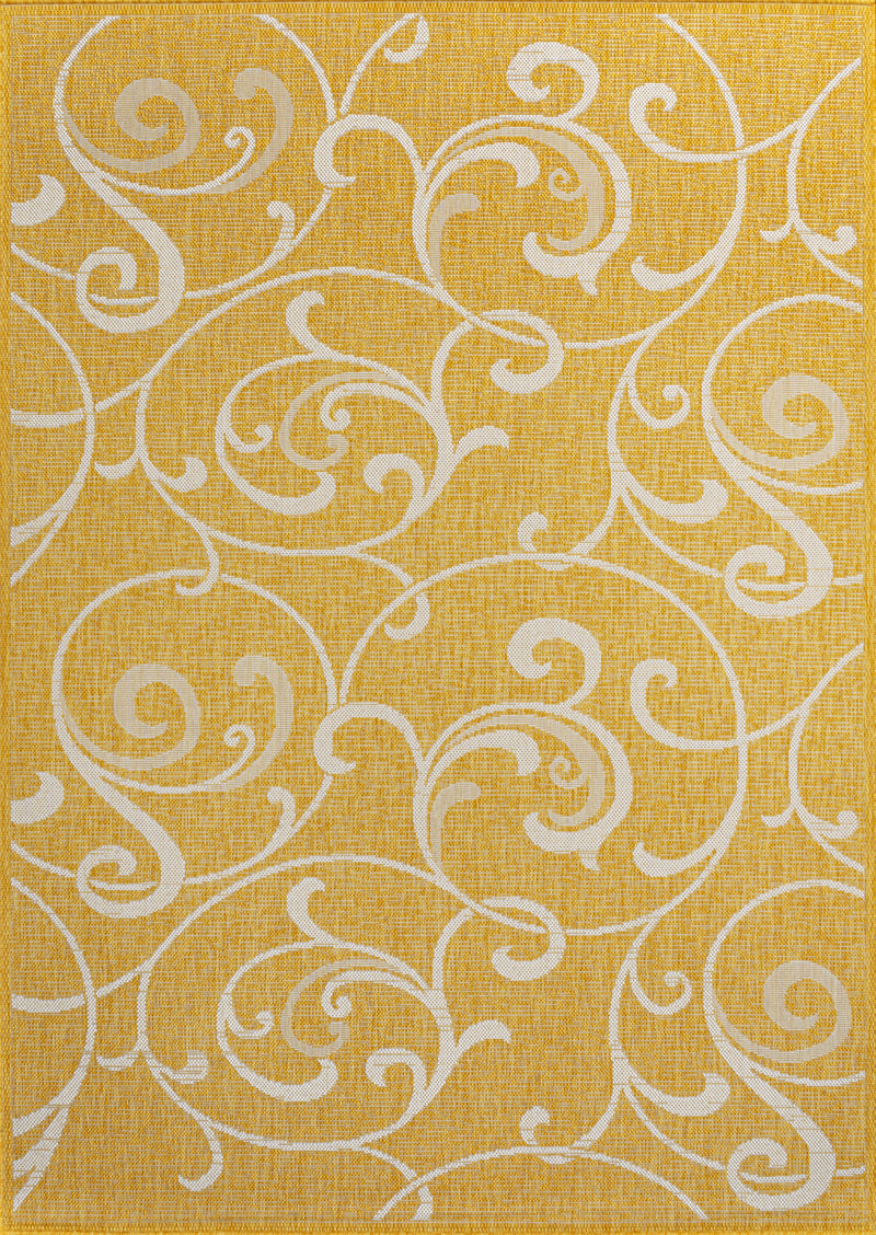 Yellow area rug with cream ornate swirl medallion pattern