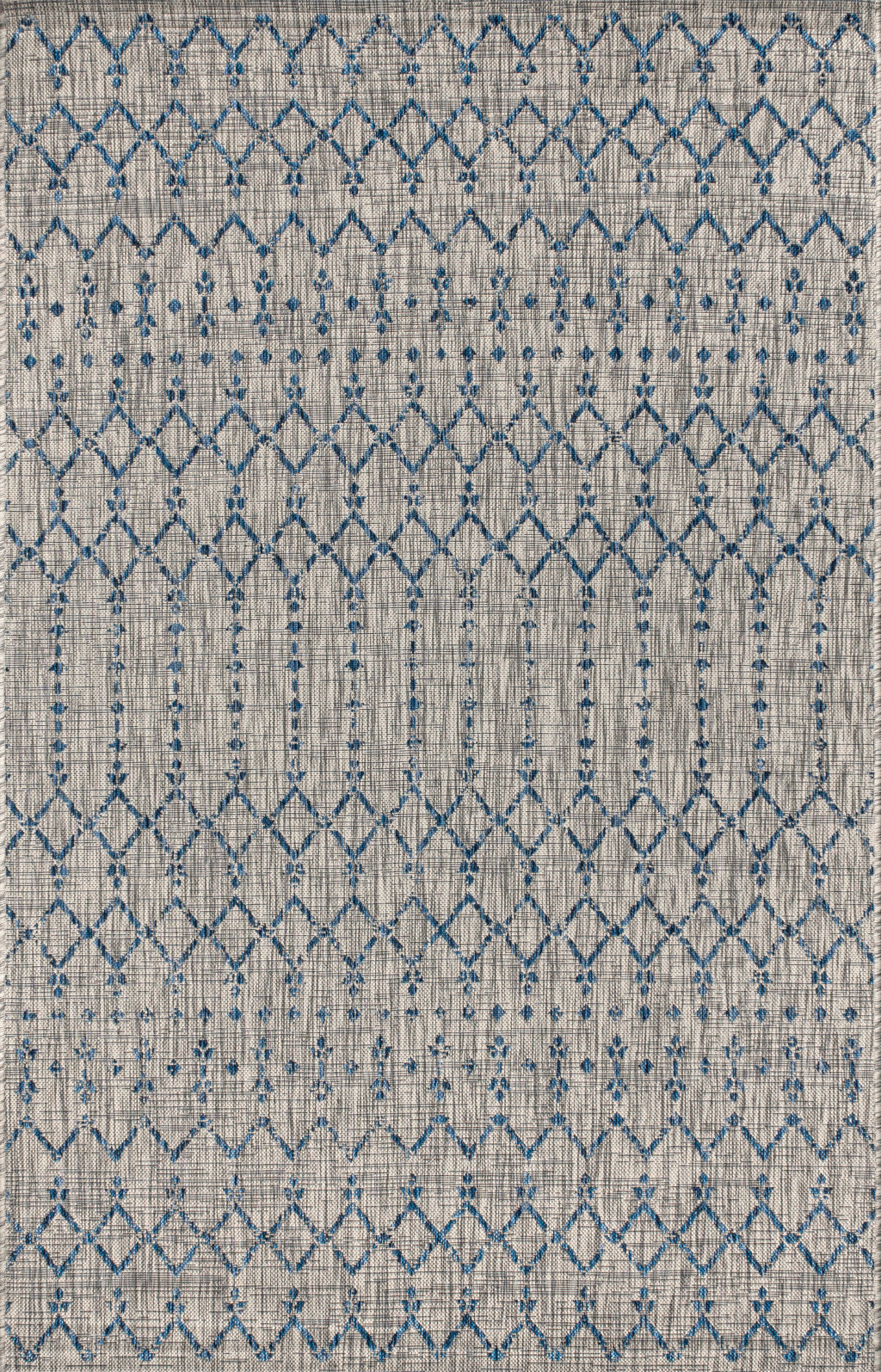 Close-up light gray rug with blue and navy trellis diamond lattice pattern