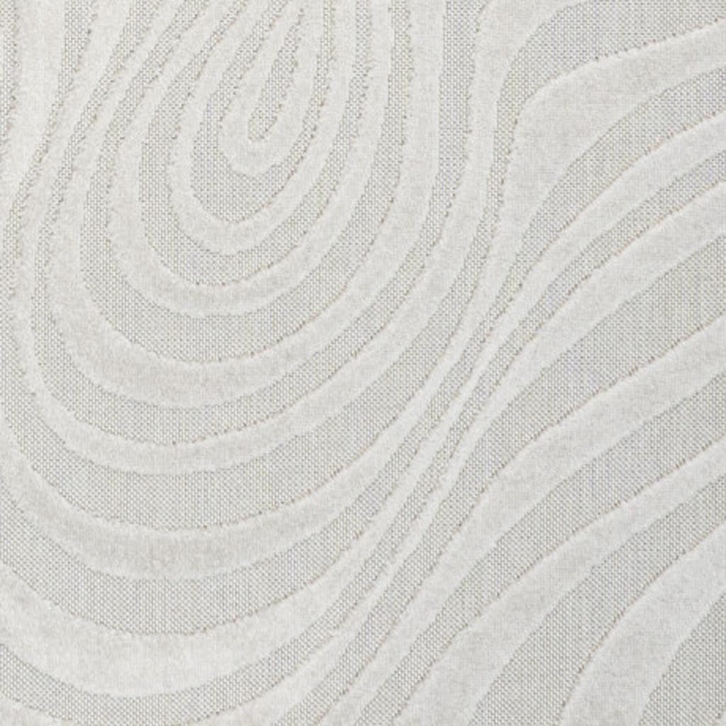 Cream and ivory rug detail with textured wavy concentric swirl pattern