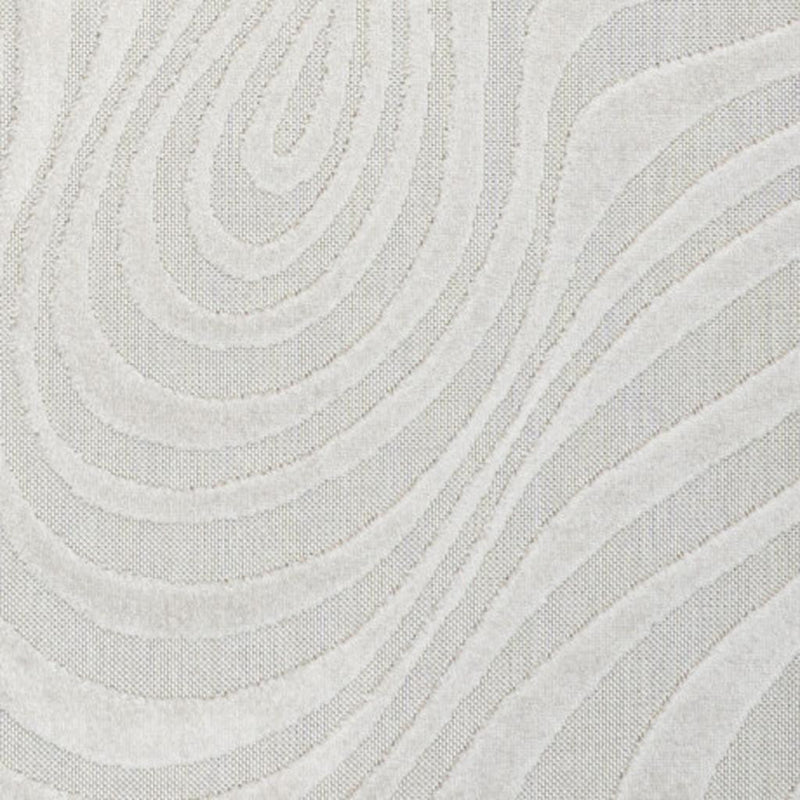 Cream and ivory rug detail with textured wavy concentric swirl pattern