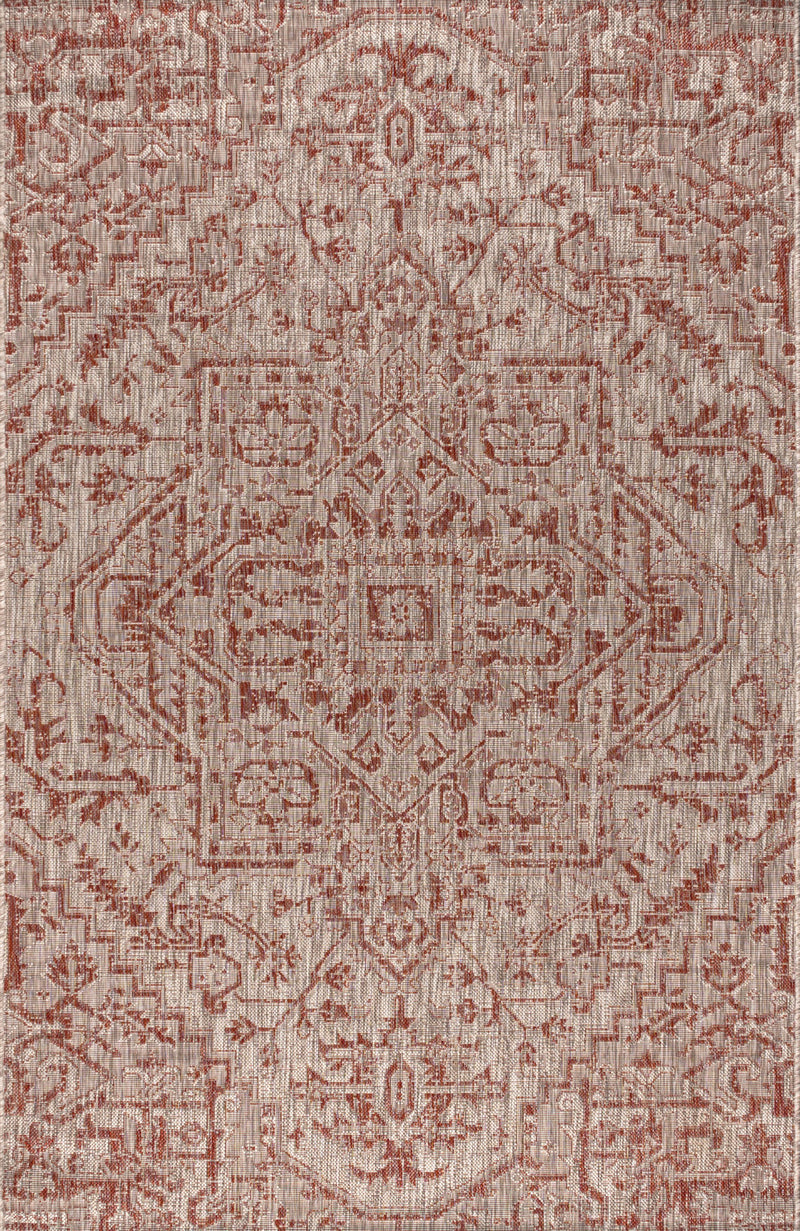 Taupe and red medallion rug detail with ornate geometric pattern
