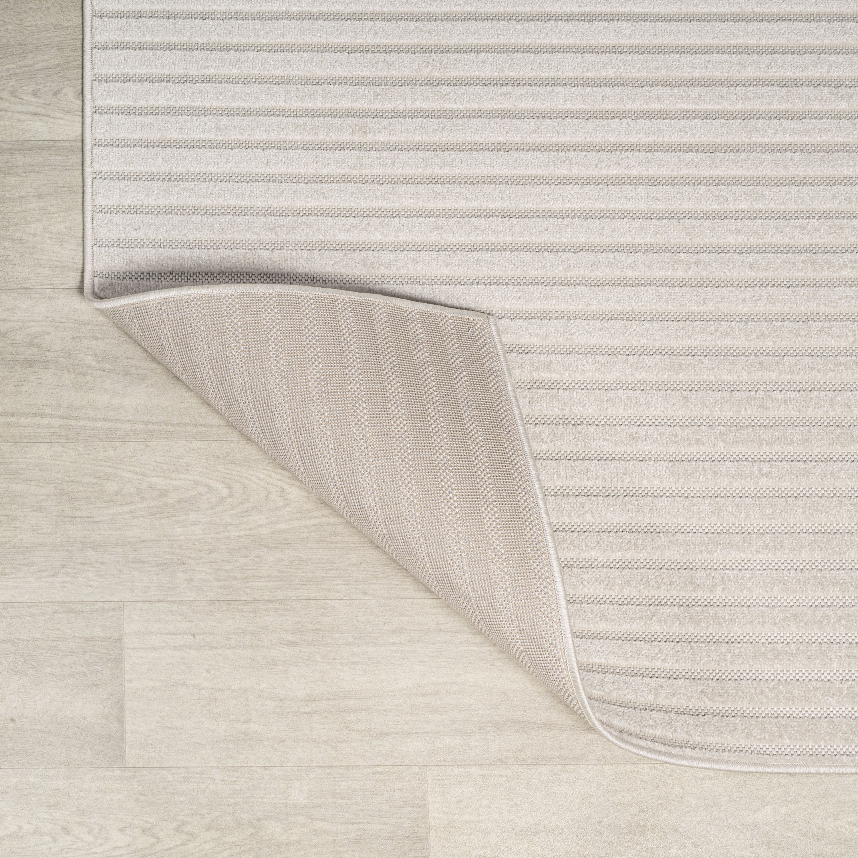 Ivory and cream square rug with bordered edge and thin horizontal stripes