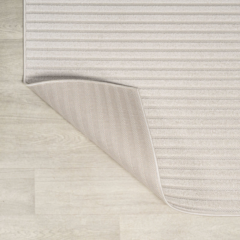Ivory and cream square rug with bordered edge and thin horizontal stripes