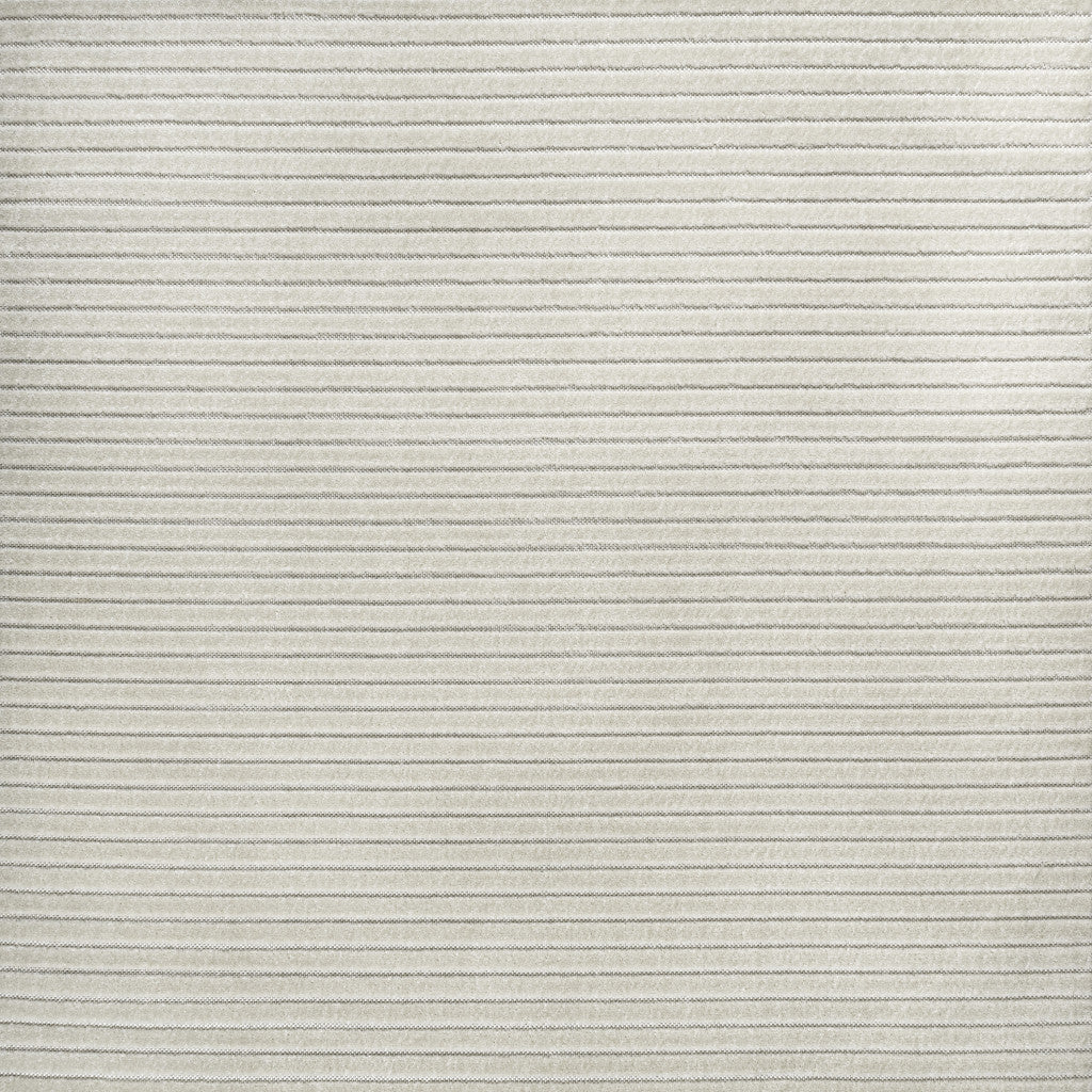 Ivory and cream area rug with fine horizontal stripe pattern and flat weave texture