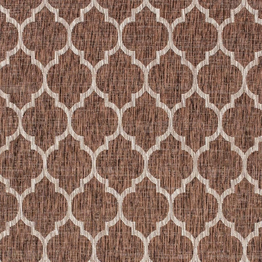 Geometric area rug with espresso-brown lattice and taupe trellis medallions