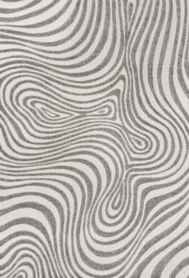 Close-up abstract area rug with gray and ivory wavy contour lines