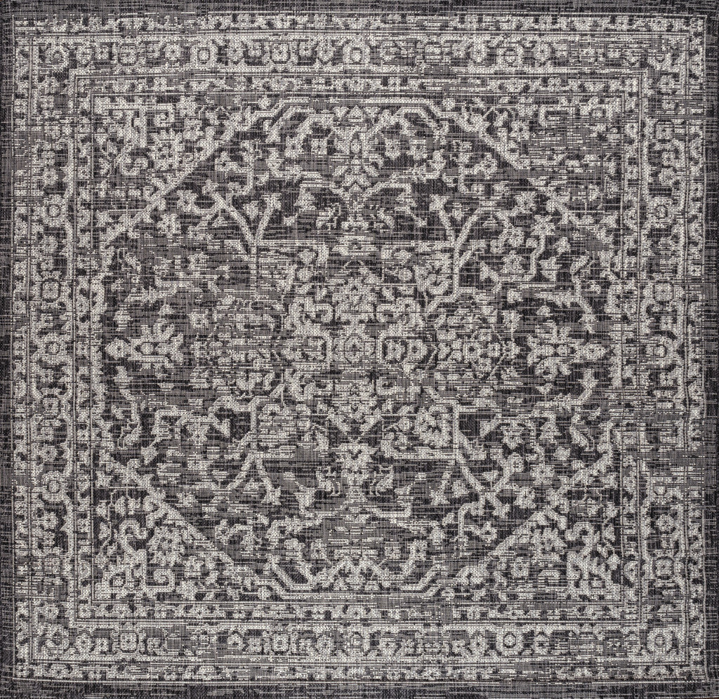 Black and gray square medallion indoor/outdoor area rug with ornate border