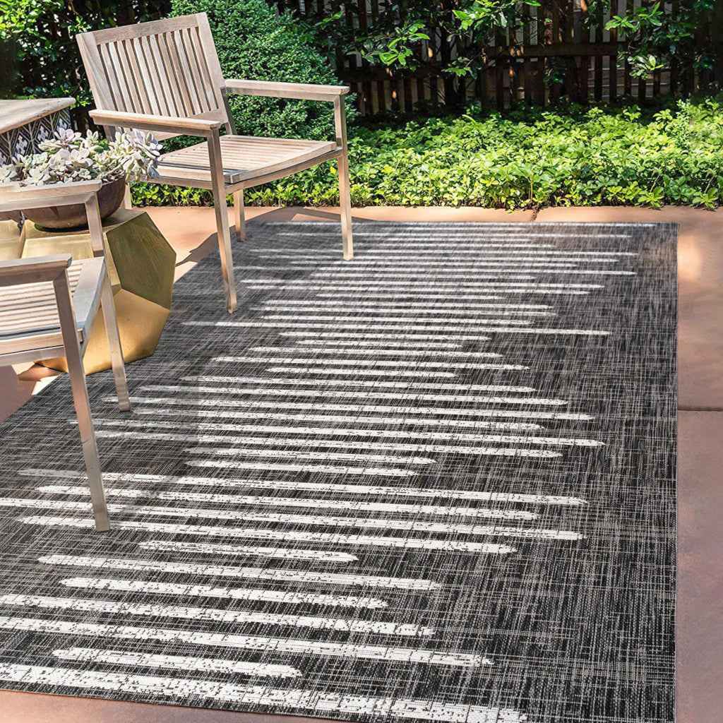 6' X 9' Black And Ivory Striped Indoor Outdoor Area Rug