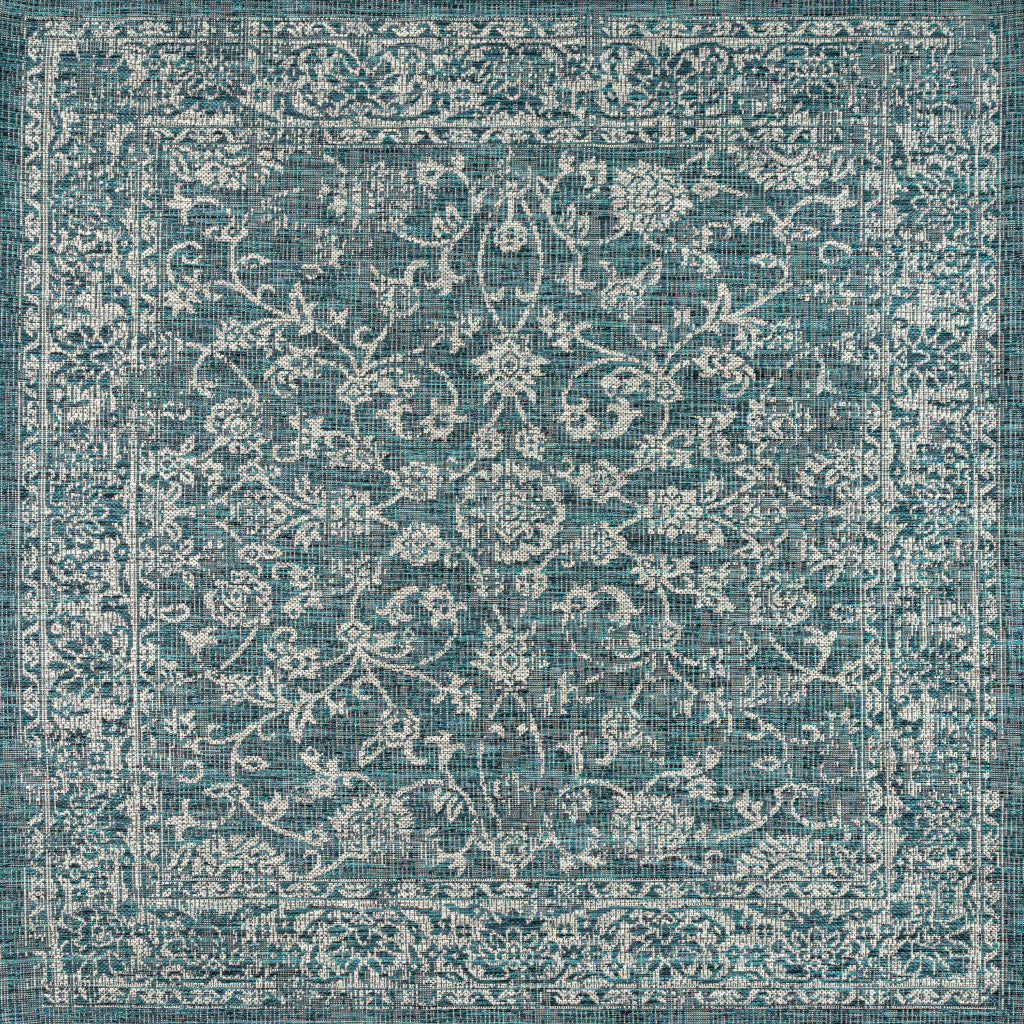 Teal and gray medallion area rug with ornate square border