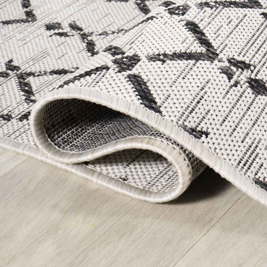 6' Cream And Black Round Trellis Indoor Outdoor Area Rug