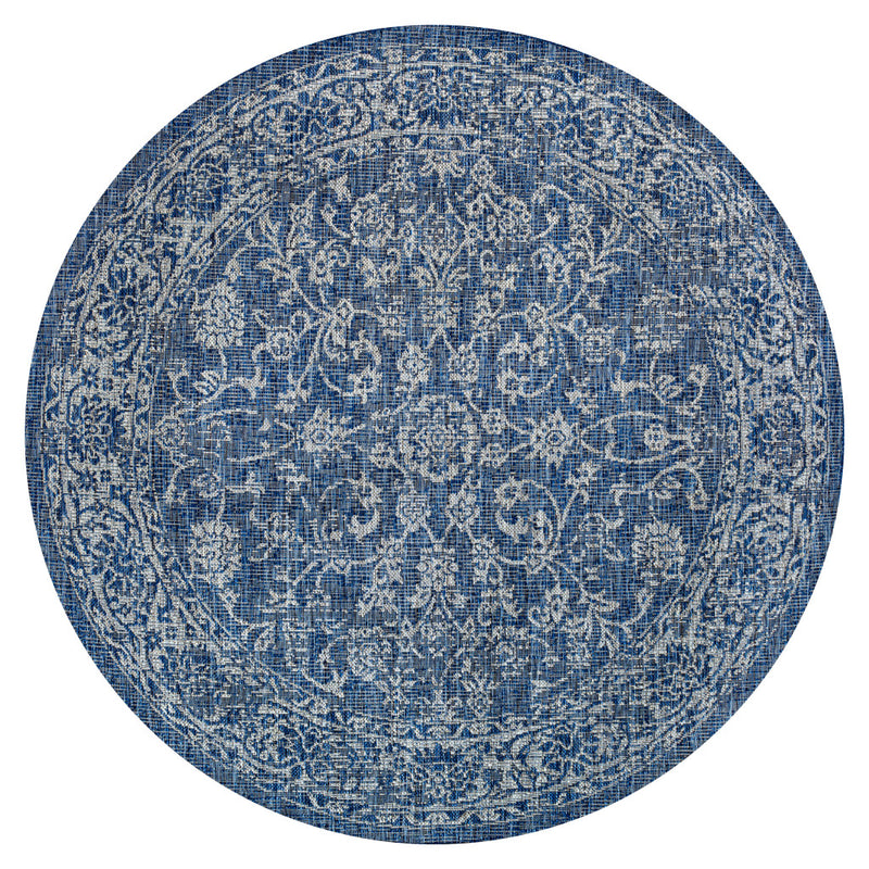 Round navy and light blue medallion rug with intricate vintage-style pattern
