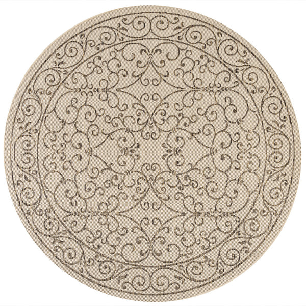 Round beige indoor/outdoor rug with brown scrolling floral medallion border pattern