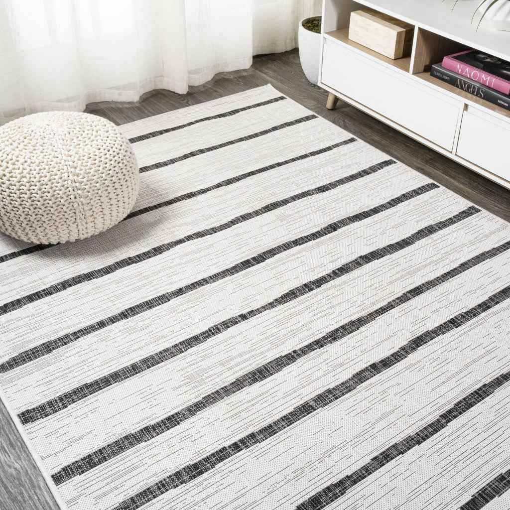 9' X 12' Ivory And Black Striped Indoor Outdoor Area Rug