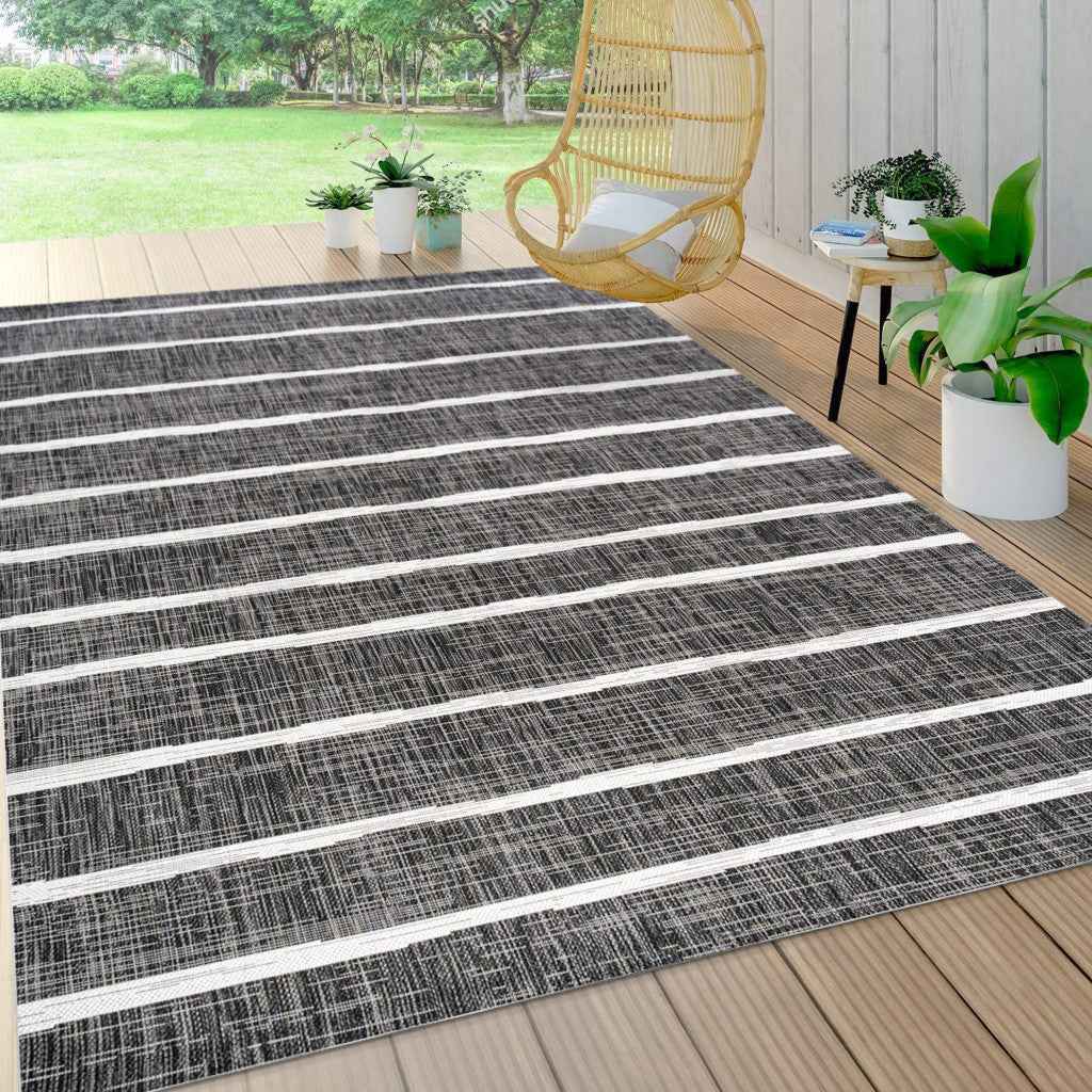 6' X 9' Black And Ivory Striped Indoor Outdoor Area Rug