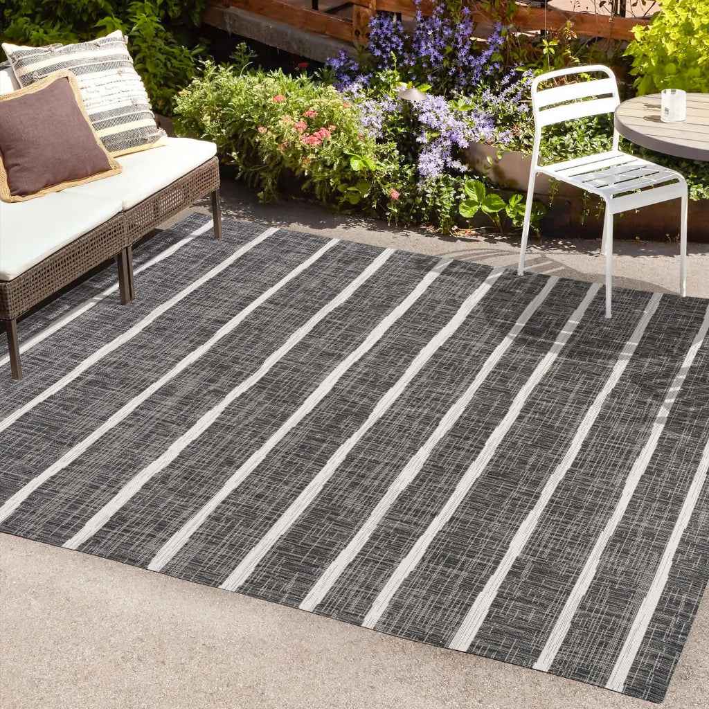 6' X 9' Black And Ivory Striped Indoor Outdoor Area Rug