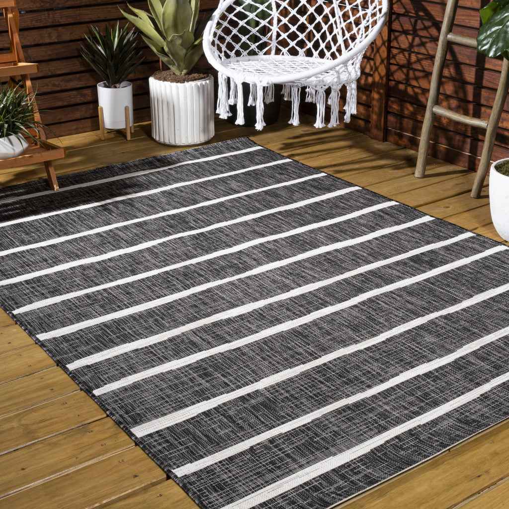 6' X 9' Black And Ivory Striped Indoor Outdoor Area Rug