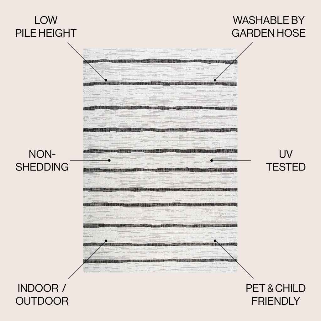 6' X 9' Ivory And Black Striped Indoor Outdoor Area Rug